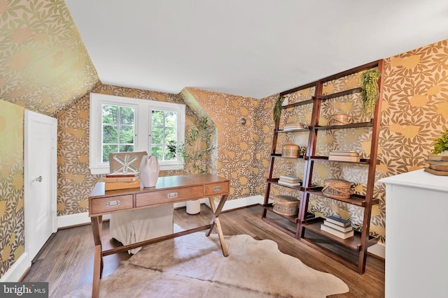 302 Ellsworth Dr, Silver Spring, MD 20910 - office with wallpapered walls, wood finished floors, vaulted ceiling, and baseboards