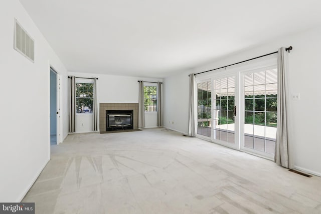 15 Horseshoe Dr, Mount Laurel, NJ 08054 - unfurnished living room with a fireplace, light colored carpet, and baseboards