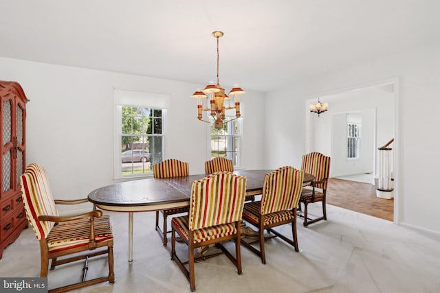 15 Horseshoe Dr, Mount Laurel, NJ 08054 - dining area featuring a chandelier, light carpet, and baseboards