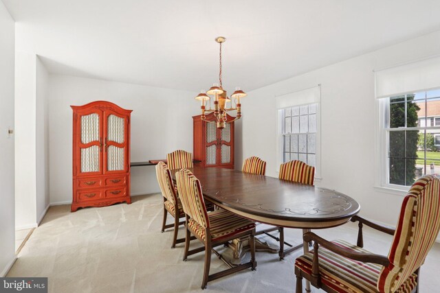 15 Horseshoe Dr, Mount Laurel, NJ 08054 - dining area featuring a chandelier, light colored carpet, and baseboards