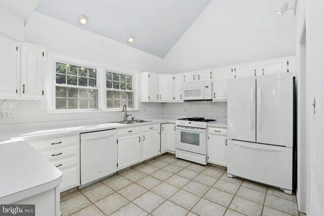 15 Horseshoe Dr, Mount Laurel, NJ 08054 - kitchen with white appliances, a sink, tasteful backsplash, light countertops, and light tile patterned floors