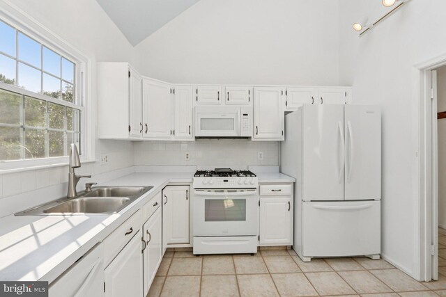 15 Horseshoe Dr, Mount Laurel, NJ 08054 - kitchen featuring white appliances, a sink, white cabinetry, and lofted ceiling