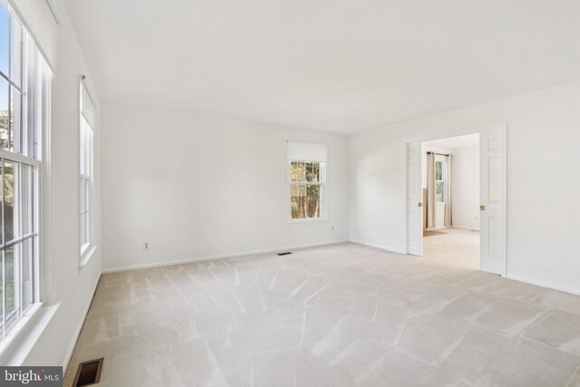 15 Horseshoe Dr, Mount Laurel, NJ 08054 - spare room featuring light carpet and baseboards