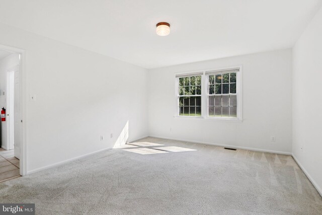 15 Horseshoe Dr, Mount Laurel, NJ 08054 - carpeted empty room with baseboards