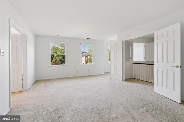15 Horseshoe Dr, Mount Laurel, NJ 08054 - carpeted spare room with arched walkways and baseboards