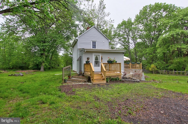 view of front of home featuring a wooden deck