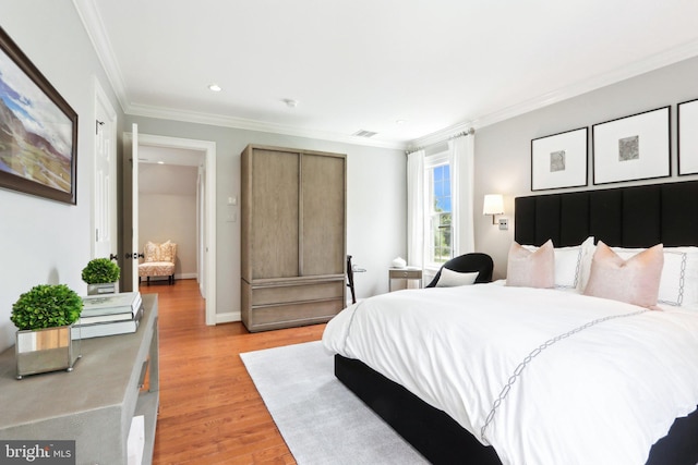 51 Farrier Ln, Newtown Square, PA 19073 - bedroom with crown molding, light wood-style flooring, recessed lighting, and baseboards