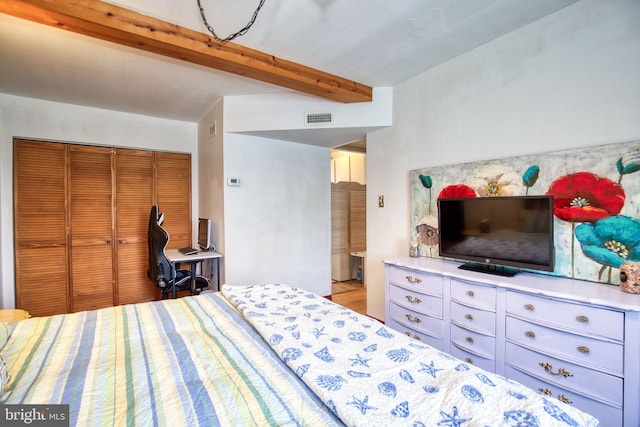 388 Monument Dr, Montross, VA 22520 - bedroom with beamed ceiling and a closet