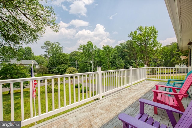388 Monument Dr, Montross, VA 22520 - wooden deck with a lawn