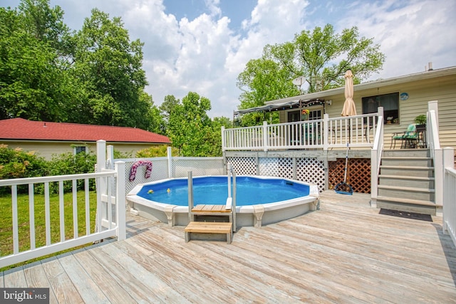 388 Monument Dr, Montross, VA 22520 - view of swimming pool with a wooden deck