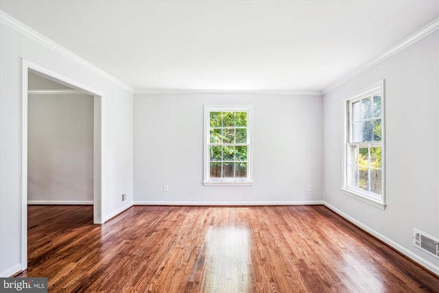 12303 Captain Smith Ct, Rockville, MD 20854 - empty room featuring healthy amount of natural light, wood finished floors, ornamental molding, and baseboards
