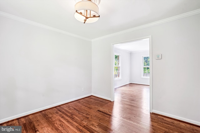 12303 Captain Smith Ct, Rockville, MD 20854 - empty room featuring baseboards, crown molding, and wood finished floors