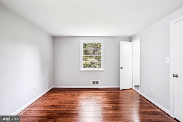12303 Captain Smith Ct, Rockville, MD 20854 - unfurnished bedroom featuring wood finished floors and baseboards