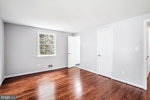 12303 Captain Smith Ct, Rockville, MD 20854 - unfurnished bedroom featuring wood finished floors and baseboards