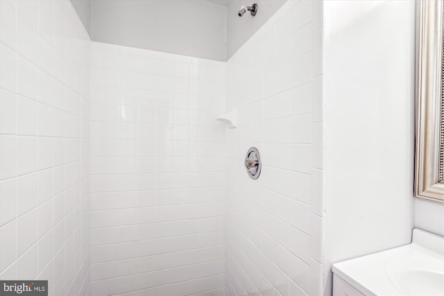 12303 Captain Smith Ct, Rockville, MD 20854 - bathroom featuring a tile shower and vanity