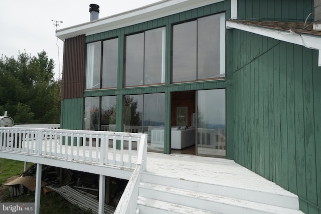 rear view of house with a deck