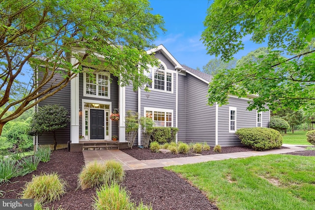 view of front of house with a front yard