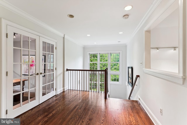 spare room featuring french doors, wood finished floors, crown molding, recessed lighting, and a smoke detector
