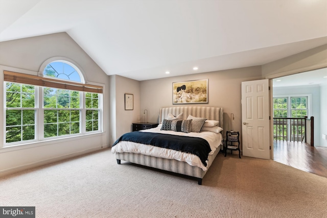 bedroom featuring lofted ceiling, carpet floors, and recessed lighting