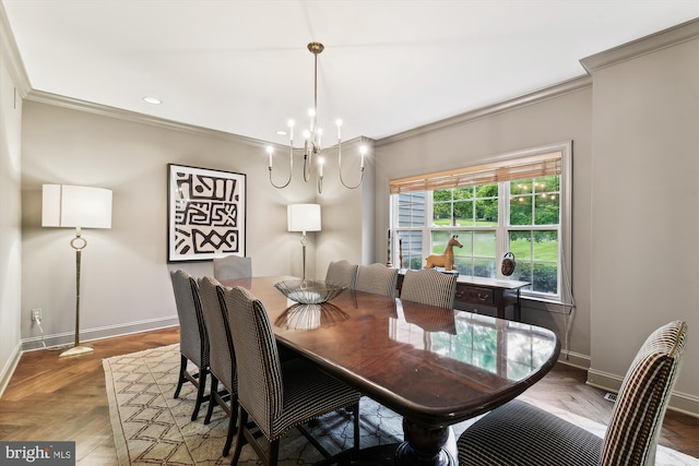 dining space featuring ornamental molding, baseboards, a chandelier, and recessed lighting