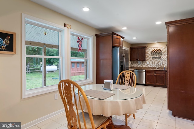 328 W Bay Front Rd, Lothian, MD 20711 - dining room with light tile patterned flooring, recessed lighting, and baseboards