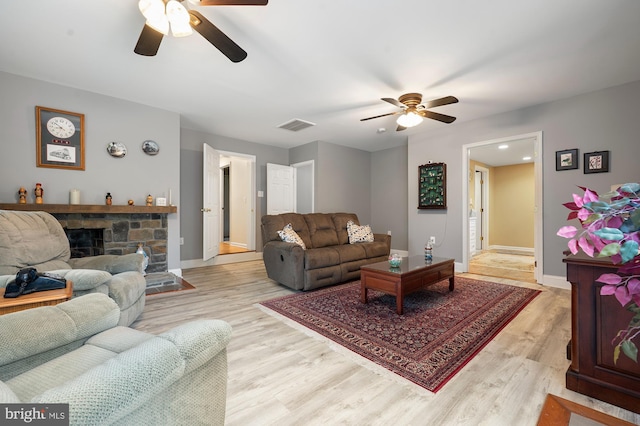 328 W Bay Front Rd, Lothian, MD 20711 - living area featuring a ceiling fan, light wood-type flooring, and baseboards