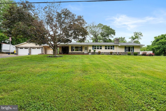 328 W Bay Front Rd, Lothian, MD 20711 - ranch-style house with driveway, a chimney, an attached garage, and a front yard