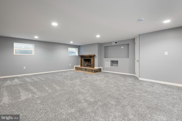 328 W Bay Front Rd, Lothian, MD 20711 - below grade area with a fireplace with raised hearth, recessed lighting, carpet floors, and baseboards