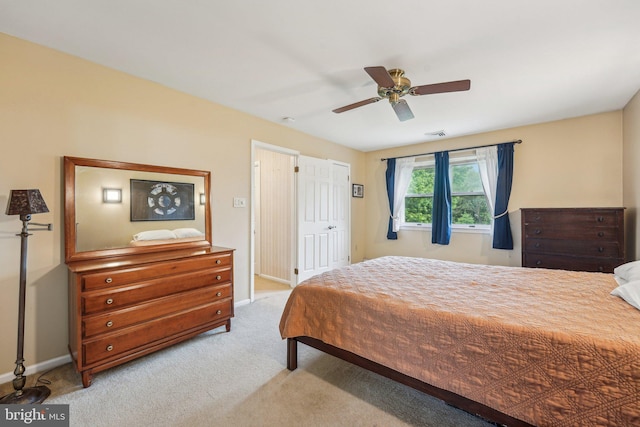 bedroom featuring carpet flooring, baseboards, and a ceiling fan