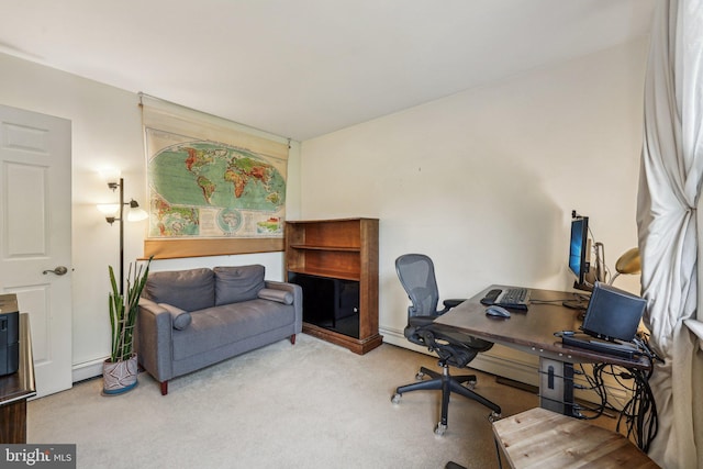 carpeted home office featuring baseboard heating