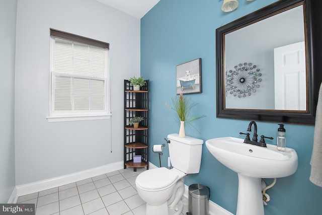 28 Blue Spruce Dr, Bear, DE 19701 - bathroom featuring toilet, baseboards, tile patterned flooring, and a sink