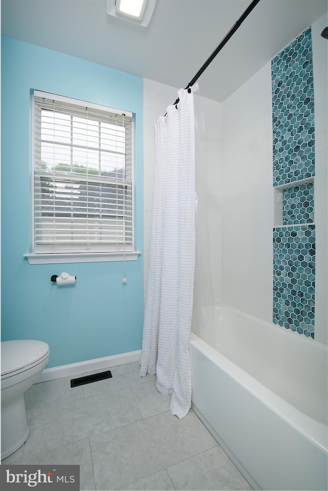 28 Blue Spruce Dr, Bear, DE 19701 - full bath with tile patterned flooring, toilet, shower / bath combo, and baseboards
