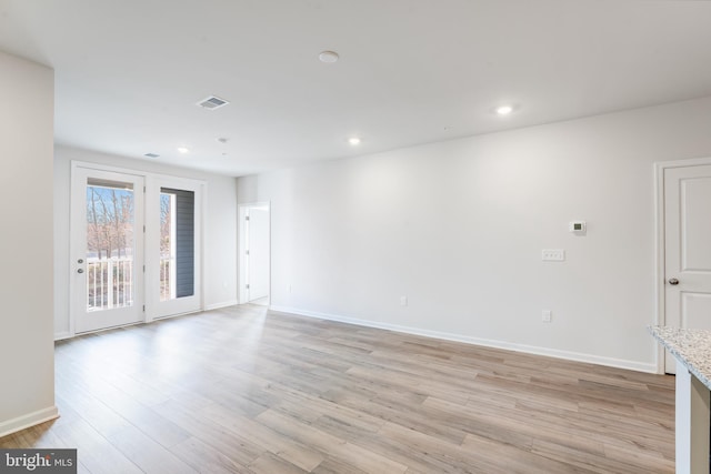 4003 Seaside Alder Rd Unit 0208, Rose, Bowie, MD 20720 - unfurnished living room featuring light wood-type flooring, baseboards, and recessed lighting
