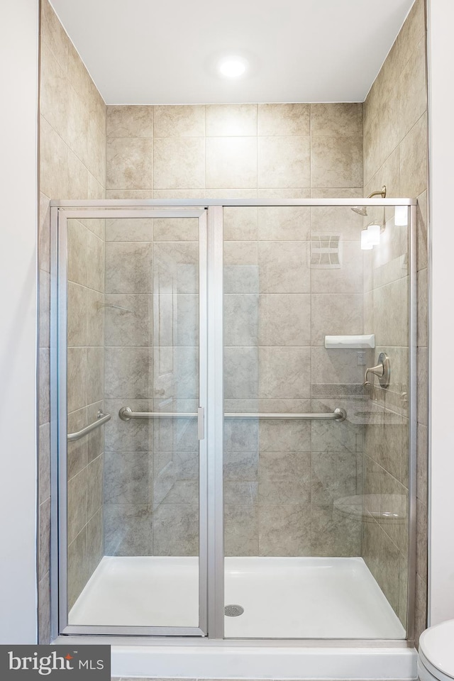 4003 Seaside Alder Rd Unit 0208, Rose, Bowie, MD 20720 - bathroom featuring a stall shower and toilet