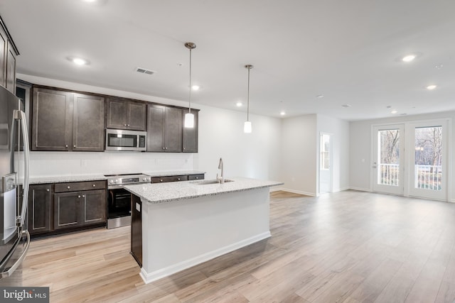 4003 Seaside Alder Rd Unit 0208, Rose, Bowie, MD 20720 - kitchen with stainless steel appliances, a sink, tasteful backsplash, dark brown cabinets, and recessed lighting