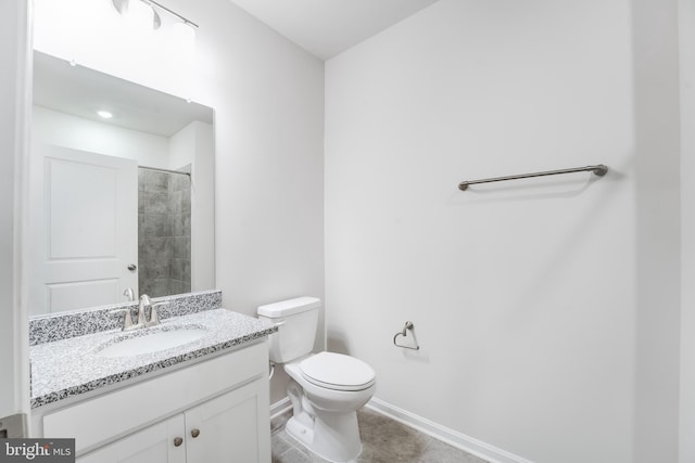 4003 Seaside Alder Rd Unit 0208, Rose, Bowie, MD 20720 - bathroom with vanity, toilet, baseboards, tile patterned flooring, and a shower