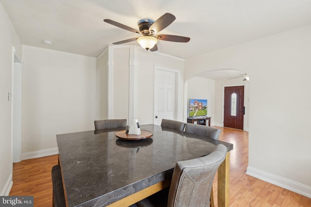 35 N Cleveland Ave, Hagerstown, MD 21740 - dining area with a ceiling fan, arched walkways, and light wood-style floors