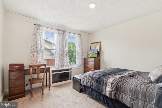 35 N Cleveland Ave, Hagerstown, MD 21740 - carpeted bedroom with radiator and a textured ceiling