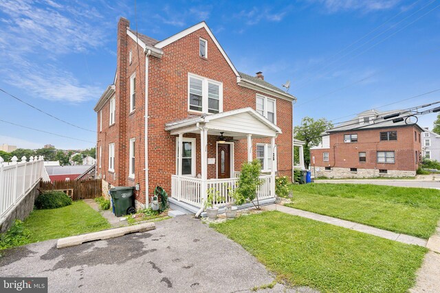 35 N Cleveland Ave, Hagerstown, MD 21740 - multi unit property featuring brick siding, a chimney, and a porch