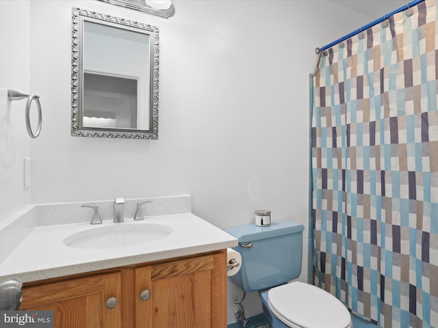 5281 Navaho Dr, Alexandria, VA 22312 - bathroom with vanity, toilet, and curtained shower