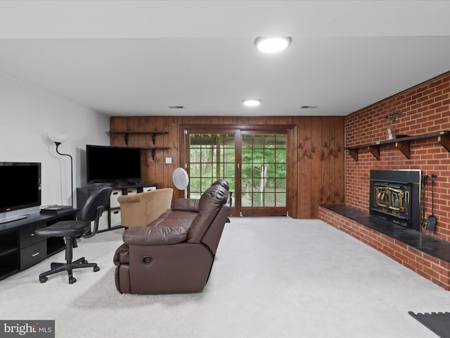 5281 Navaho Dr, Alexandria, VA 22312 - carpeted living room featuring wood walls, an office area, and a brick fireplace