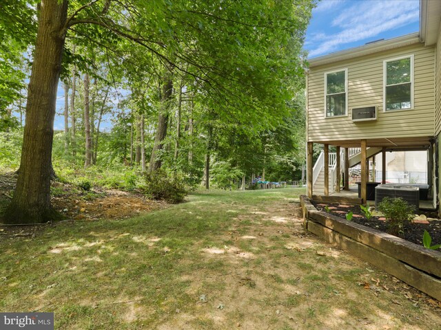 5281 Navaho Dr, Alexandria, VA 22312 - view of green lawn featuring stairs and cooling unit