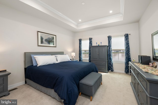 30366 Indigo Way, Georgetown, DE 19947 - bedroom with multiple windows, baseboards, a tray ceiling, light colored carpet, and recessed lighting