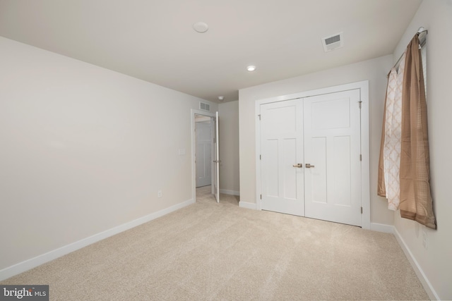 30366 Indigo Way, Georgetown, DE 19947 - unfurnished bedroom featuring light carpet, baseboards, a closet, and recessed lighting
