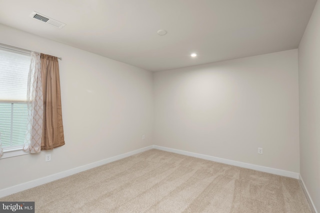 30366 Indigo Way, Georgetown, DE 19947 - unfurnished room with light carpet, baseboards, and recessed lighting