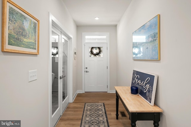 30366 Indigo Way, Georgetown, DE 19947 - entryway with wood finished floors, baseboards, and recessed lighting
