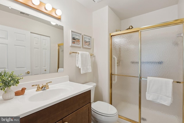 803 Coxswain Way Unit 107, Annapolis, MD 21401 - bathroom featuring vanity, toilet, and a shower stall