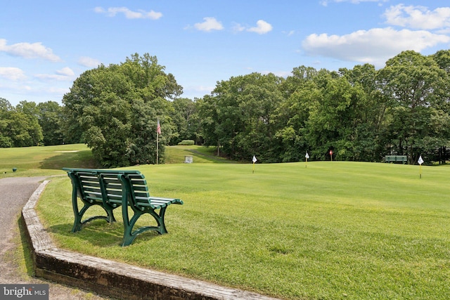 803 Coxswain Way Unit 107, Annapolis, MD 21401 - surrounding community featuring view of wooded area, a yard, view of golf course, and a putting area
