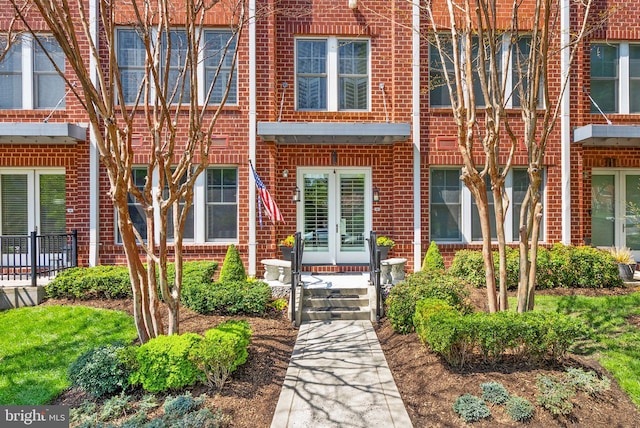 1418 N Rhodes St Unit B105, Arlington, VA 22209 - property entrance featuring brick siding