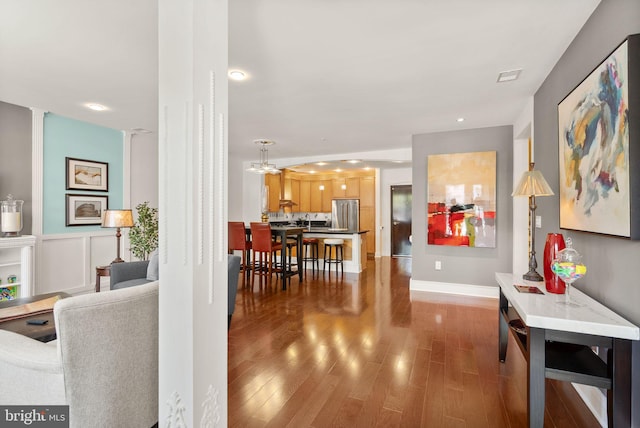 1418 N Rhodes St Unit B105, Arlington, VA 22209 - hallway featuring wood finished floors and recessed lighting